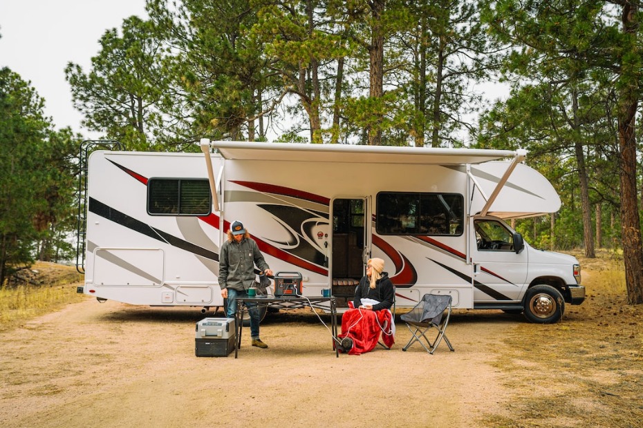 Portable solar panel canopy with lithium battery providing off-grid power for outdoor camping setup