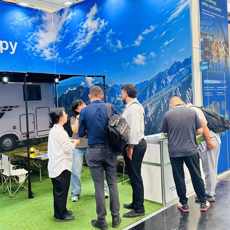 Wistek booth crowded with international clients exploring the innovative off-grid Solar Canopy at the energy exhibition.